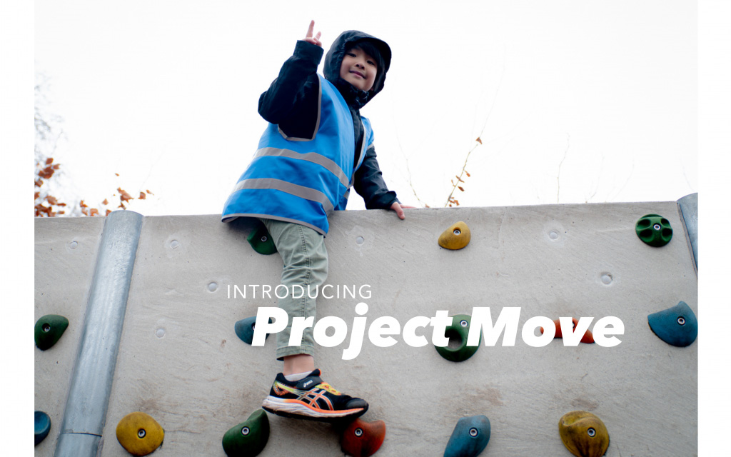 Child climbing a rock wall with "Introducing Project Move" text overlay.